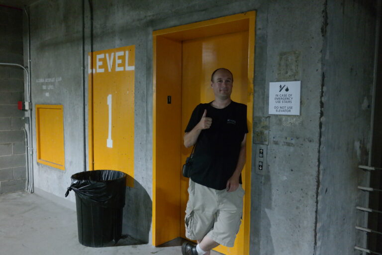 Andrew Reams in front of elevator